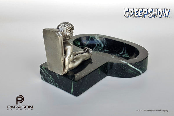 Creepshow movie prop replicas by Paragon FX Group. We are honored to have recreated George A Romero's "The Travelling Ashtray" or "Roaming Ashtray" from the beloved 1982 horror anthology, Creepshow. Manufactured from 4 pounds of solid marble, this limited edition, full-size prop replica is adorned with a pewter cherub.